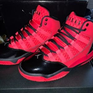 Jordans max aura red and black.